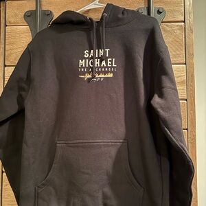 Black Hoodie with Saint Michael Text and Cozy Fabric. Men’s size small.